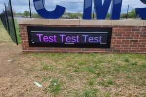 Fabricated 3d, three dimensional letter CM on a monument sign
